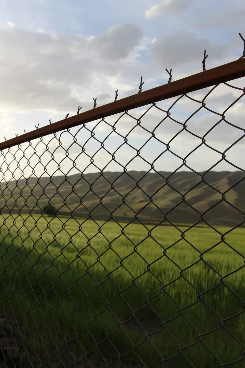 A newly installed grey metal security fence panel, the kind of clean, professional work that helps a fencing contractor win more jobs
