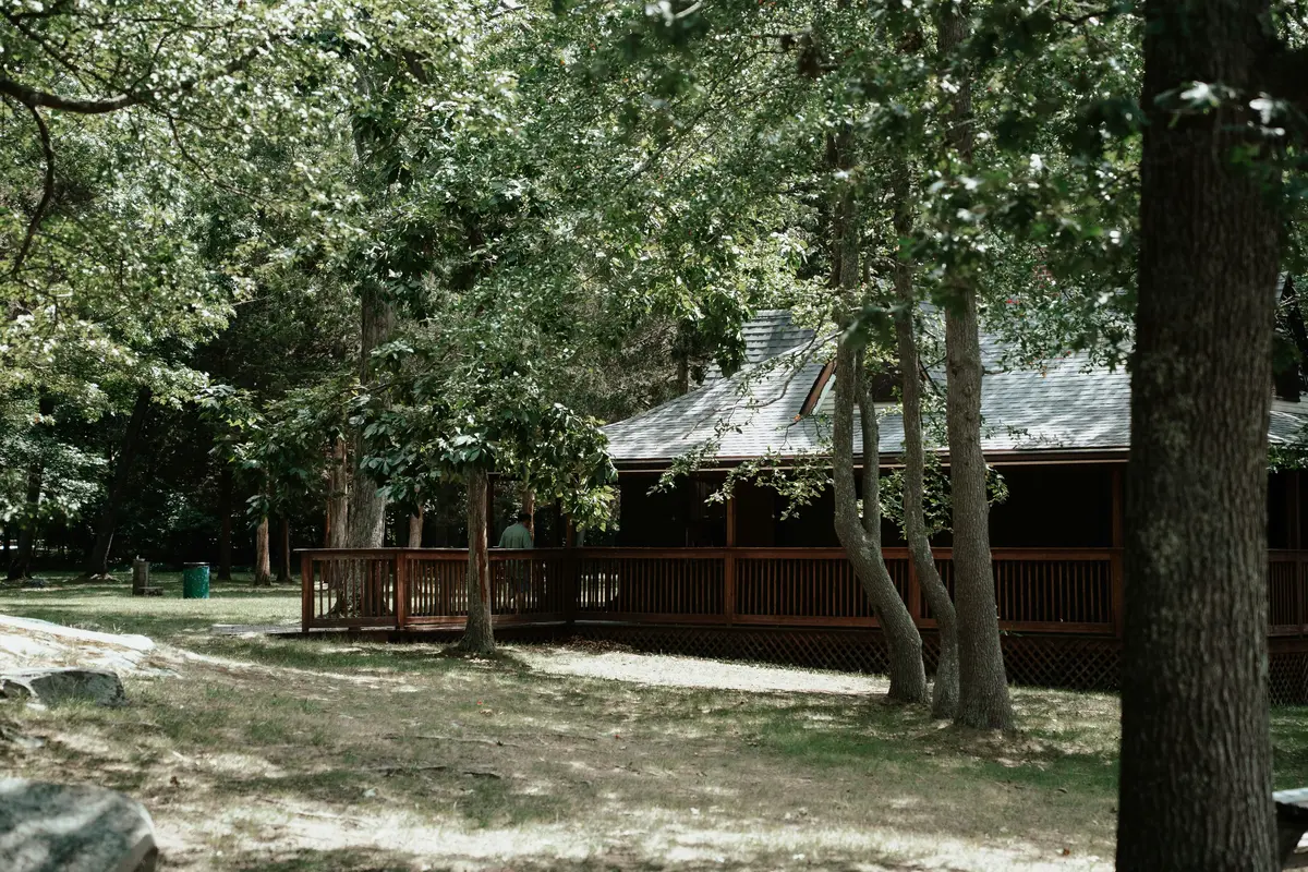 A cosy guesthouse cabin with a porch, the kind of stay that leads to a repeat booking